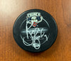 #9 Brendan Bell Autographed Game Puck - 2009-10
