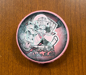#5 Nate Guenin Autographed Pink in the Rink Souvenir Puck - 2011-12