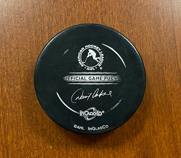 #70 Kris Russell Autographed Game Puck - 2008-09
