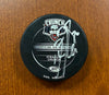 #70 Kris Russell Autographed Game Puck - 2008-09